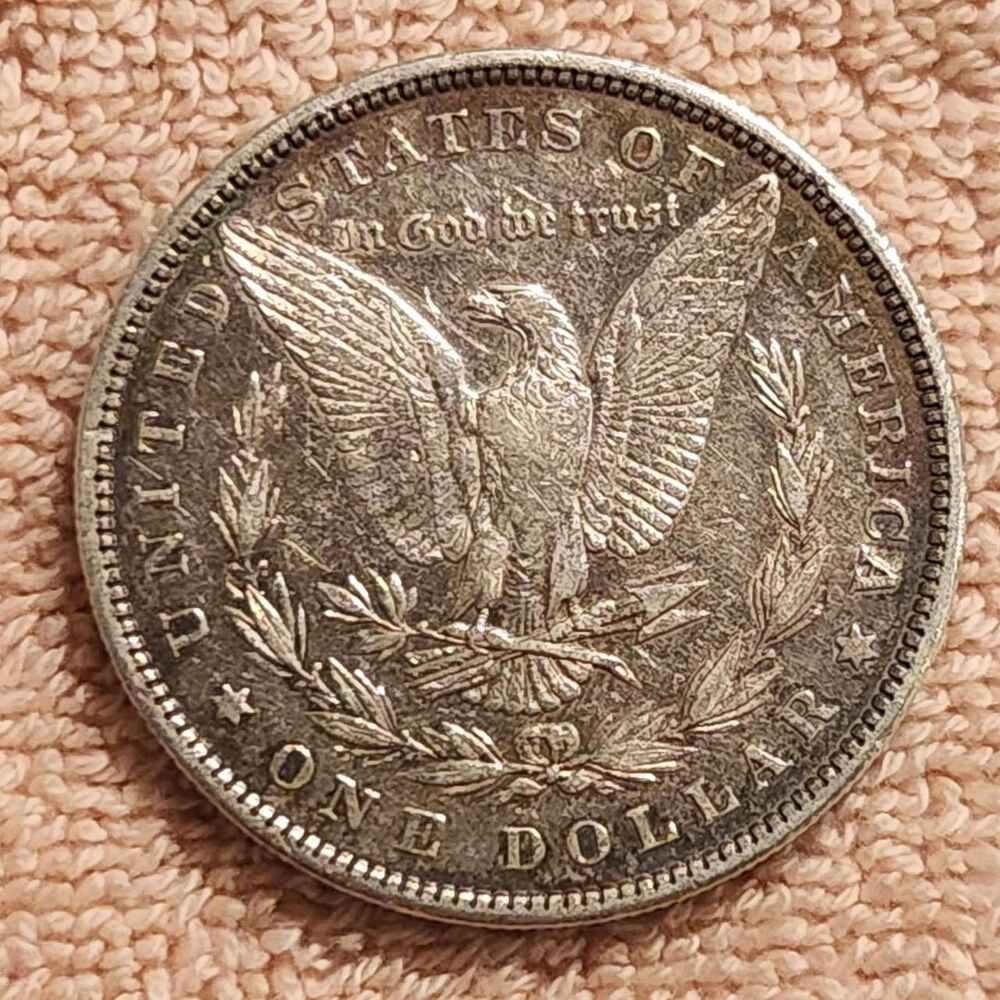 1882 Morgan Silver Dollar. 90% silver.
...